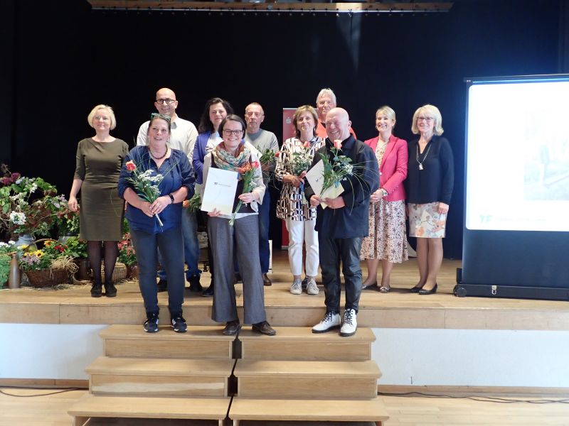Preisträger und Gratulanten